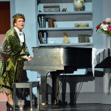 Madame Arcati playing the piano