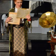 Madame Arcati reading covers of records