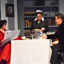 Charles and Ruth being served by Edith